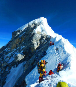 In which country is the world's largest mountain, Mount Everest, located